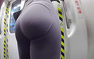 Yoga student's ass in gray leggings