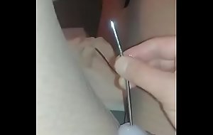 Caged sissy in nylons sounding her clitty