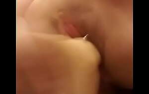 Cheri gender her pierced pussy with a big dildo