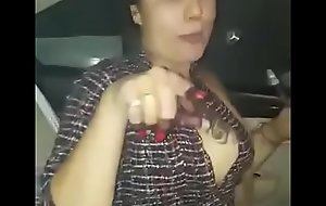 Desi sexy Indian girl smokin' hookah and sparking with respect to car