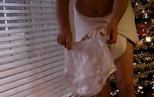 ABDL diapered sissy  cumming in wet diapers by xmas tree