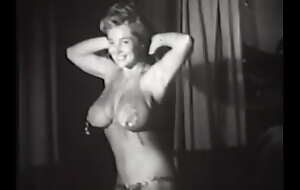 Vintage babe with brawny heart of hearts dancing sexy on stage for erotic filming 50s
