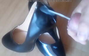 Massive cumshot in excess of neighbour's conceited heels (heels bukakke)