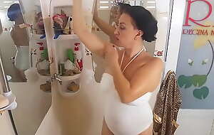 A lovely lass shaves her armpits in get under one's shower room, lathers her company with shower gel. cam 1-3