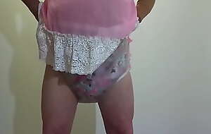 Sissy in Chastity Pees in His Diaper by Pinky 396