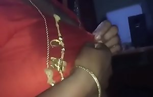 Tamil aunty showing knockers and preparing to fuck.