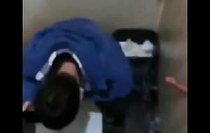 Caught on cam blowjob inside the toilet.