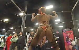 Black stripper does a sexy dance for me on bed frame at EXXXotica NJ 2021.