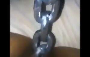 Crazy Mombasa woman inserts chain inside her fur pie