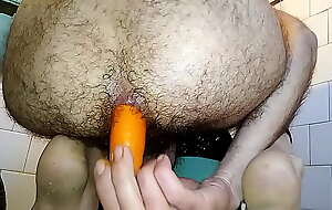 Sticking a big carrot in the matter of my hairy ass
