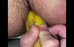 Banana With condom into ass