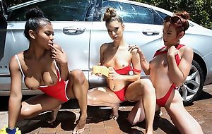 Three slim beauties serve lucky stud after giving him a off colour carwash