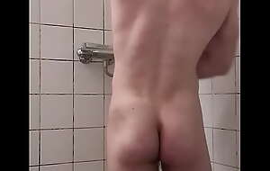 MuscleMan take a shower nearby private house
