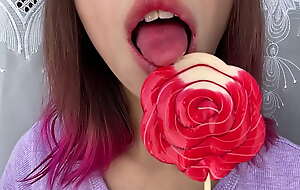 Naughty stepsister deep-throats a lollipop and act out her longing hot sexy tongue
