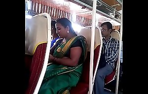 Aunty in bus.. blouse nipple visible... Watch delicately 1