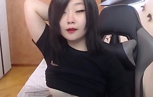 Oriental emo teen undresses anent reveal sexy natural body