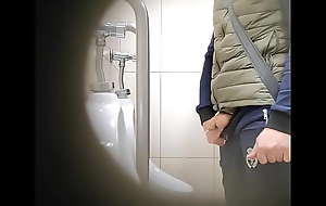 Secretive cam in the mall toilet