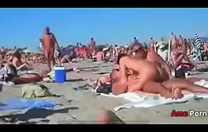Horny couples fucking on nudist beach