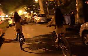 Riding our bike naked thumb the streets of the city - Dollscult