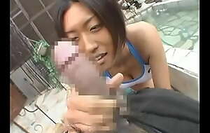 Oriental Weighty tanned girl on Volleyball margin