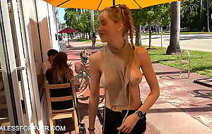 Shan enjoys a coffee with her boobs exposed