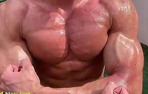 Big ripped muscle guy flexing training and in like manner his big toned muscles!