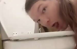 Slow-witted slut licking toilet