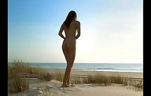 Miss France Melody Vilbert in a nudist placard video