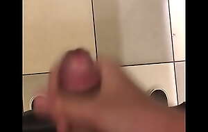 Oriental sponger jerking off in mall rest room