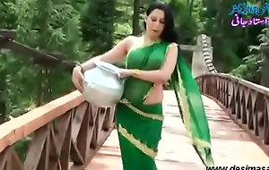 Roopi Shah Paki slut lacking upon blouse - nipple showing upon wet saree- Desimasala.co